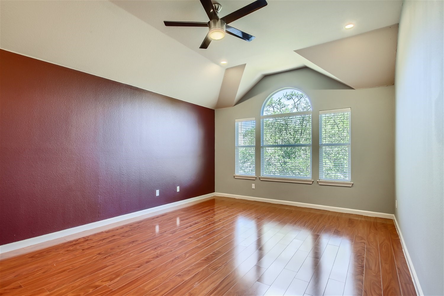 5320 Spirea Cove Austin, TX 78749 - Photo 15 of 28 an empty room with a window and wooden floor
