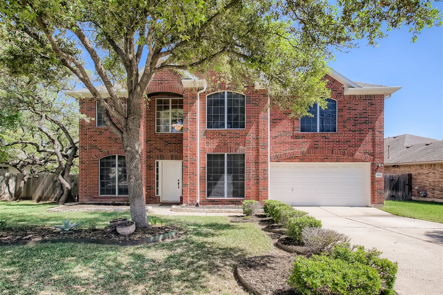 5320 Spirea Cove Austin, TX 78749 - Photo 2 of 28 front view of a house with a yard