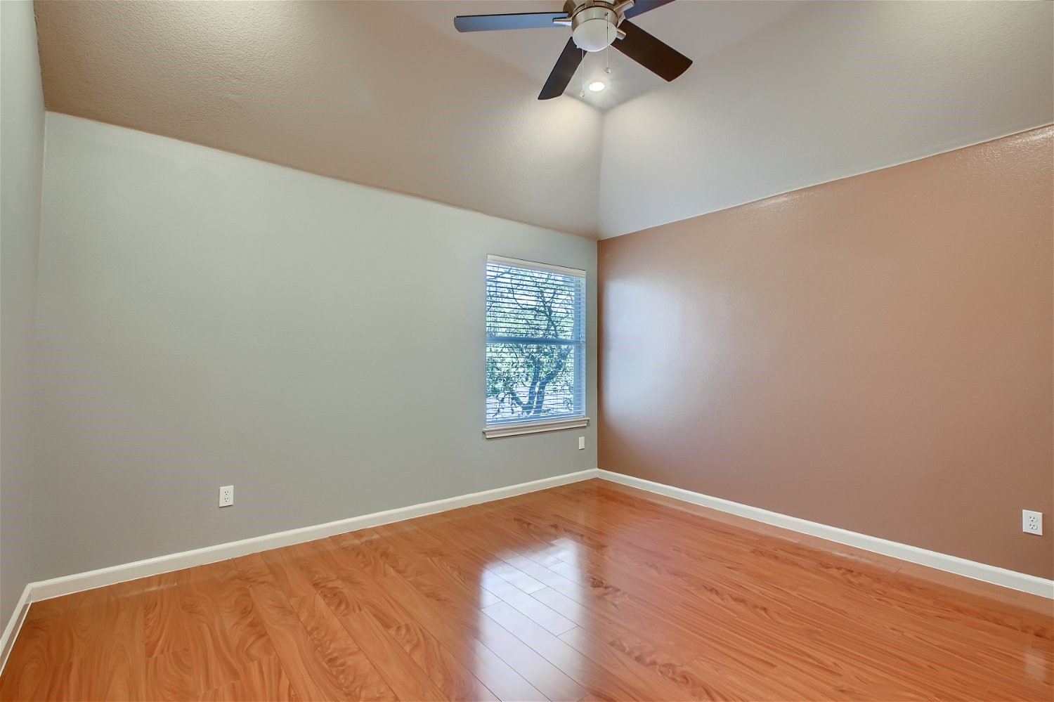 5320 Spirea Cove Austin, TX 78749 - Photo 22 of 28 an empty room with a window and ceiling fan