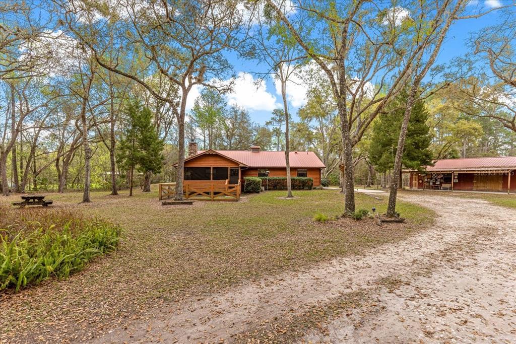 6750 Northeast 137th Place Citra, FL 32113 - Photo 1 of 1 a view of a house with a yard