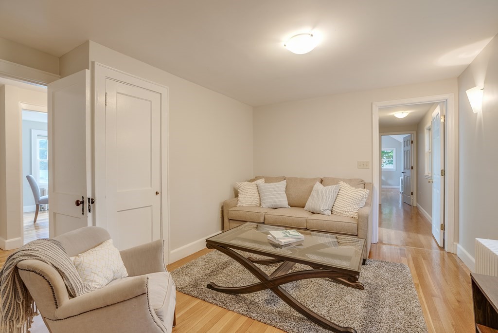 62 Gleason Road Lexington, MA 02420 - Photo 13 of 39 a living room with furniture and a couch