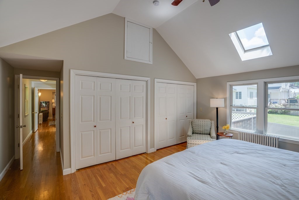 62 Gleason Road Lexington, MA 02420 - Photo 15 of 39 a spacious bedroom with a bed and a window