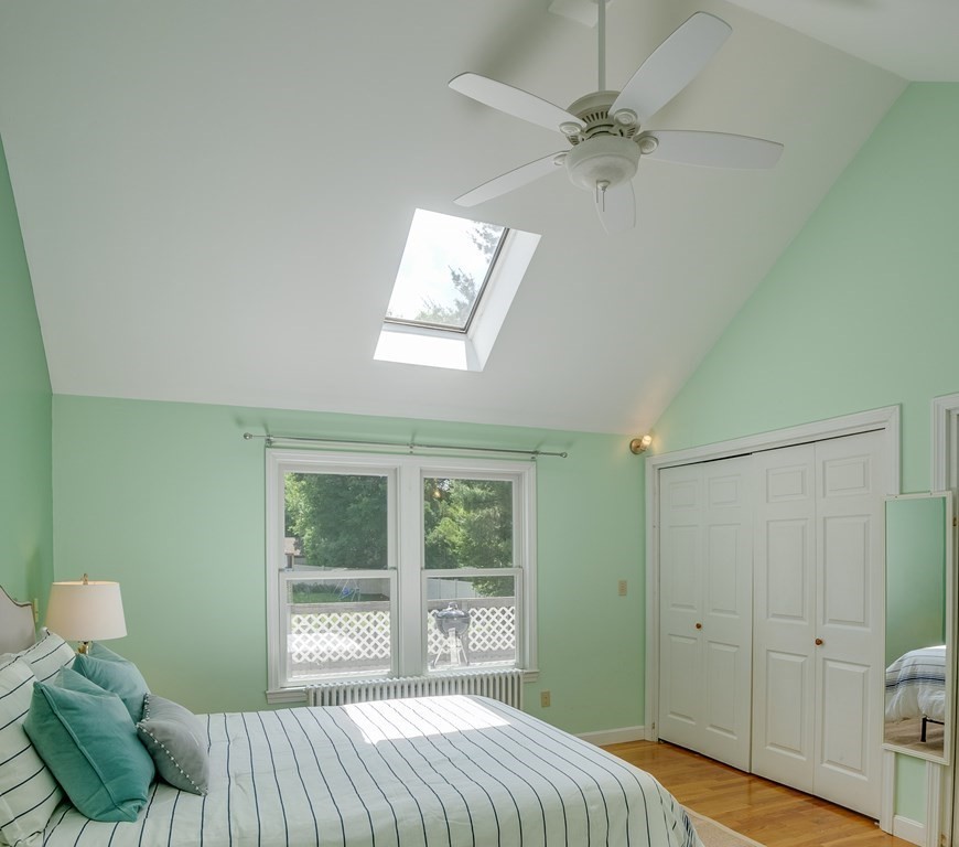 62 Gleason Road Lexington, MA 02420 - Photo 17 of 39 a bedroom with a bed and window