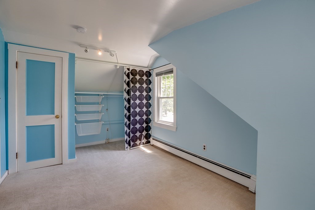 62 Gleason Road Lexington, MA 02420 - Photo 21 of 39 a view of room with closet and utility room