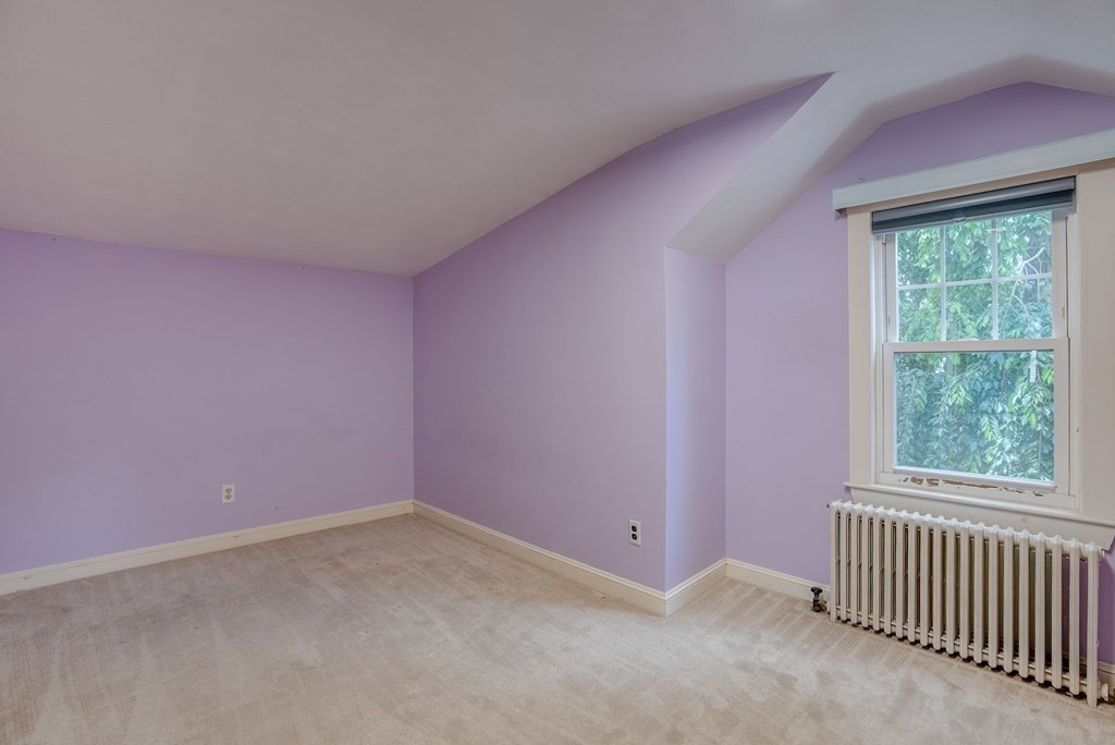 62 Gleason Road Lexington, MA 02420 - Photo 24 of 39 an empty room with a window