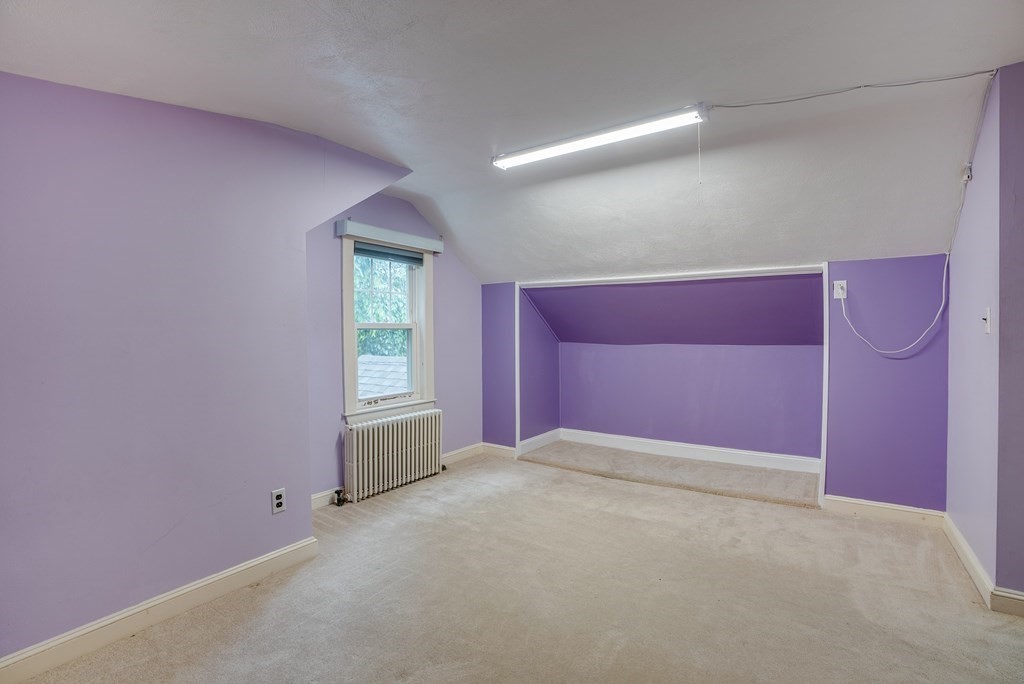 62 Gleason Road Lexington, MA 02420 - Photo 25 of 39 a view of an empty room with a window