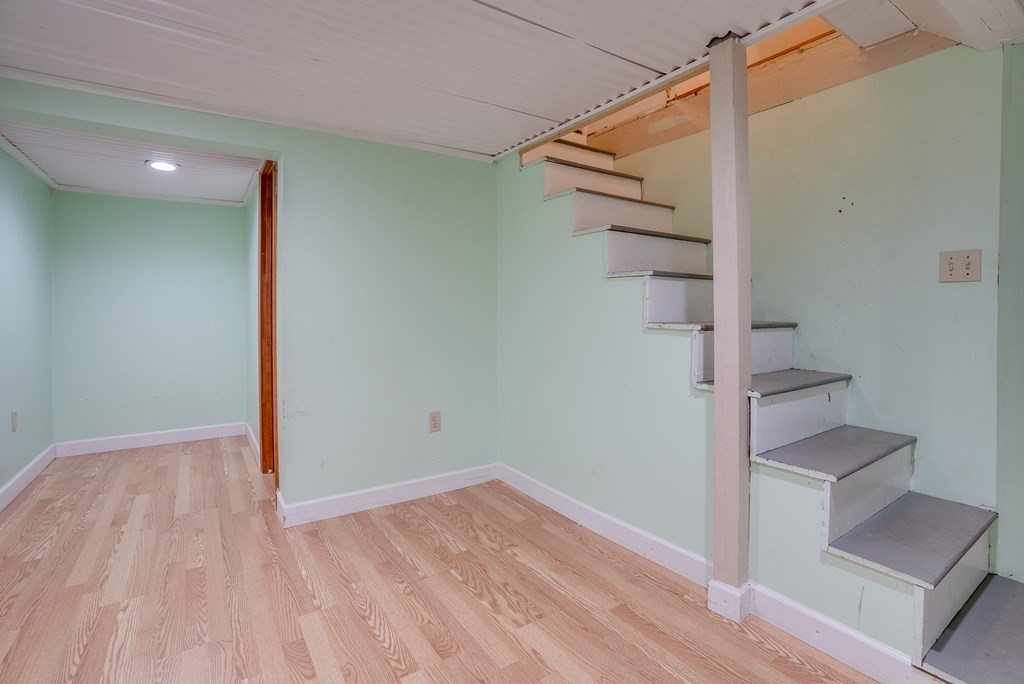 62 Gleason Road Lexington, MA 02420 - Photo 26 of 39 a view of empty room with wooden floor