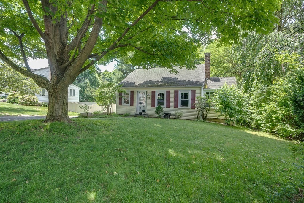 62 Gleason Road Lexington, MA 02420 - Photo 32 of 39 a front view of a house with a yard