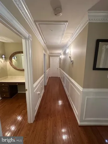 a view of entryway with wooden floor