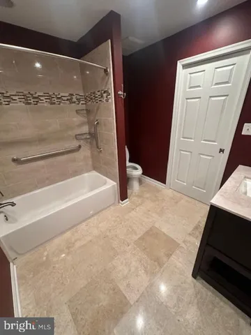 a bathroom with a bathtub