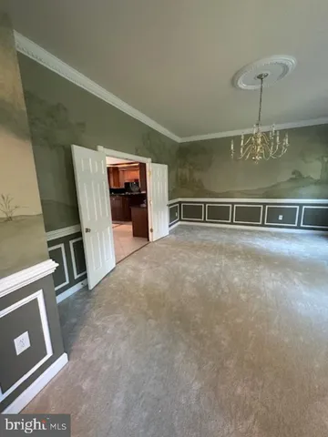 a view of livingroom with furniture and window
