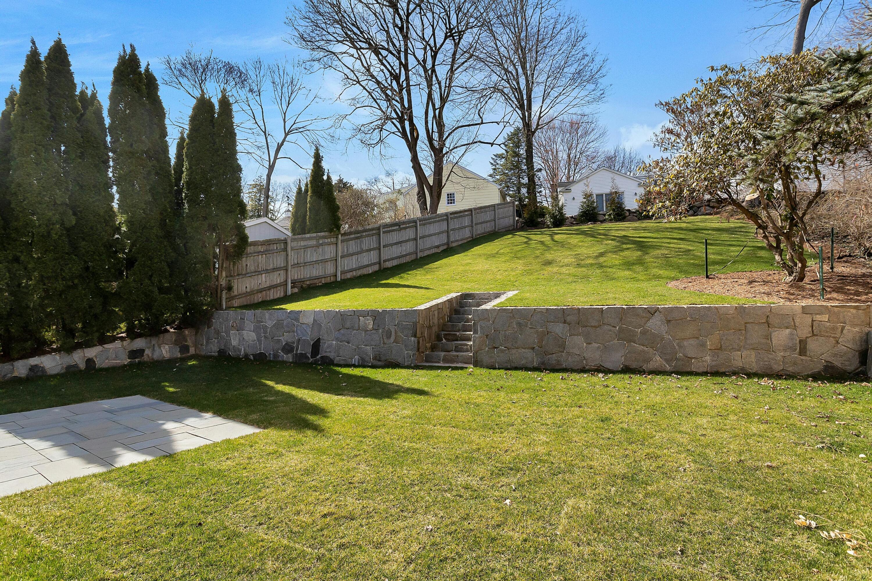 34 Crimmins Road Darien, CT 06820 - Photo 24 of 28 a view of a backyard with swimming pool