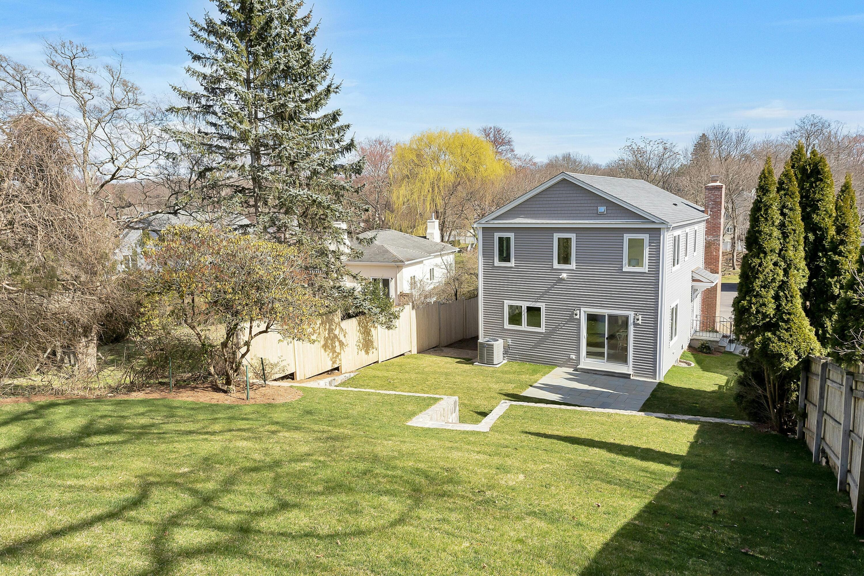 34 Crimmins Road Darien, CT 06820 - Photo 27 of 28 a view of a house with a yard