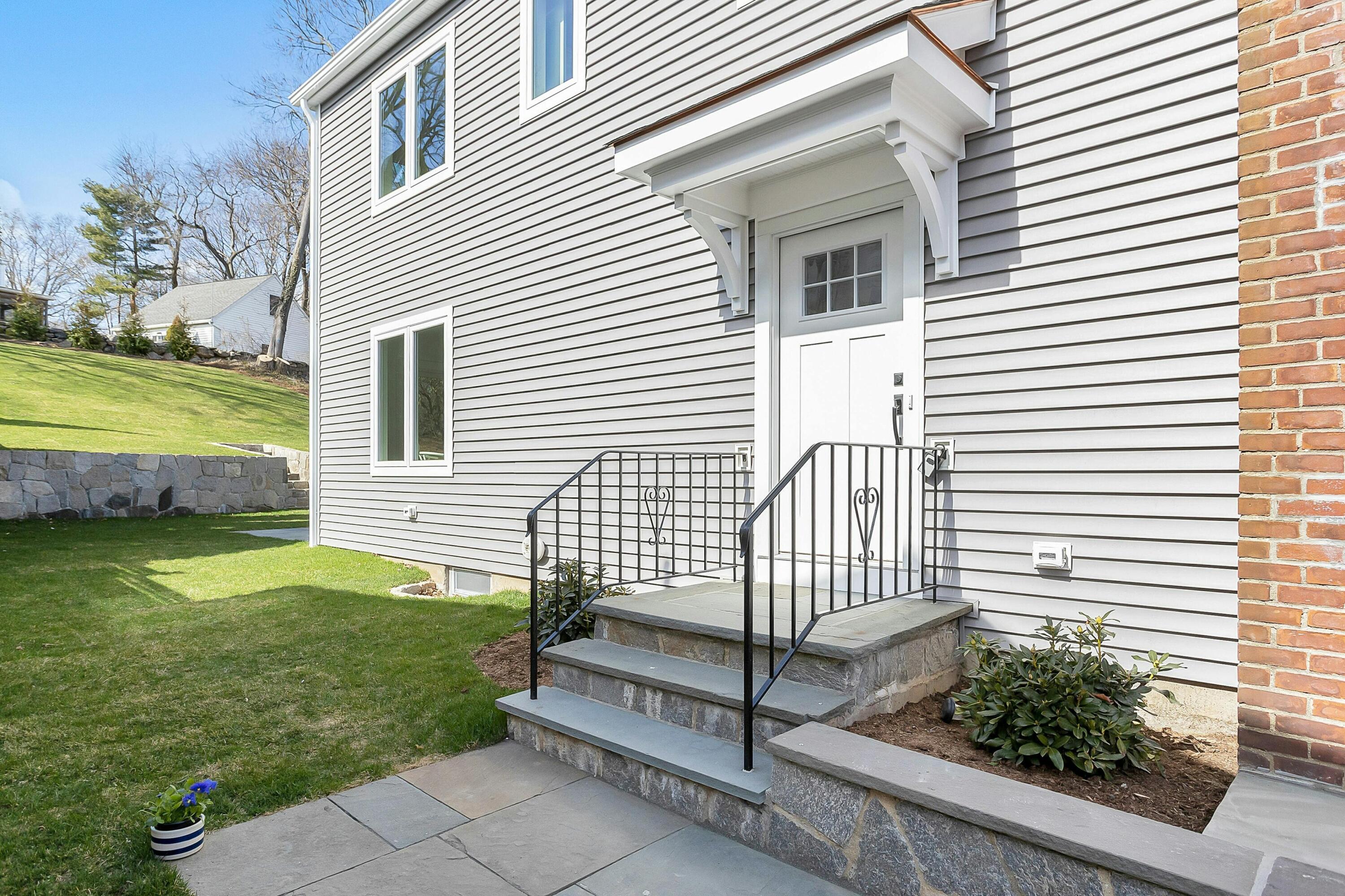 34 Crimmins Road Darien, CT 06820 - Photo 28 of 28 a view of a house with backyard and a garden