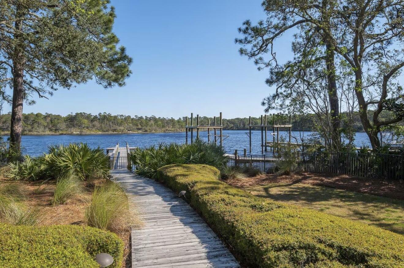 37 Grande Pointe Drive Inlet Beach, FL 32461 - Photo 51 of 58 a view of swimming pool with lake and houses in the back