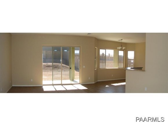 4678 Edgemont Road Prescott Valley, AZ 86314 - Photo 4 of 24 a black and white photo of a living room