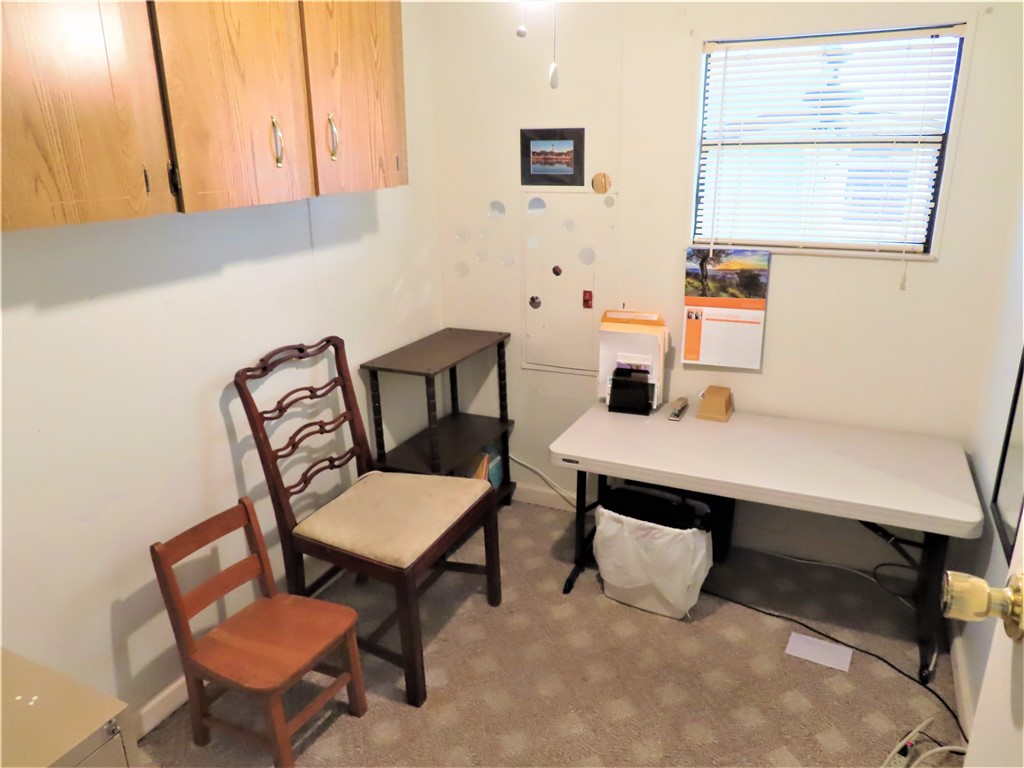 629 Marlin Circle Barefoot Bay, FL 32976 - Photo 24 of 34 a view of a workspace with furniture