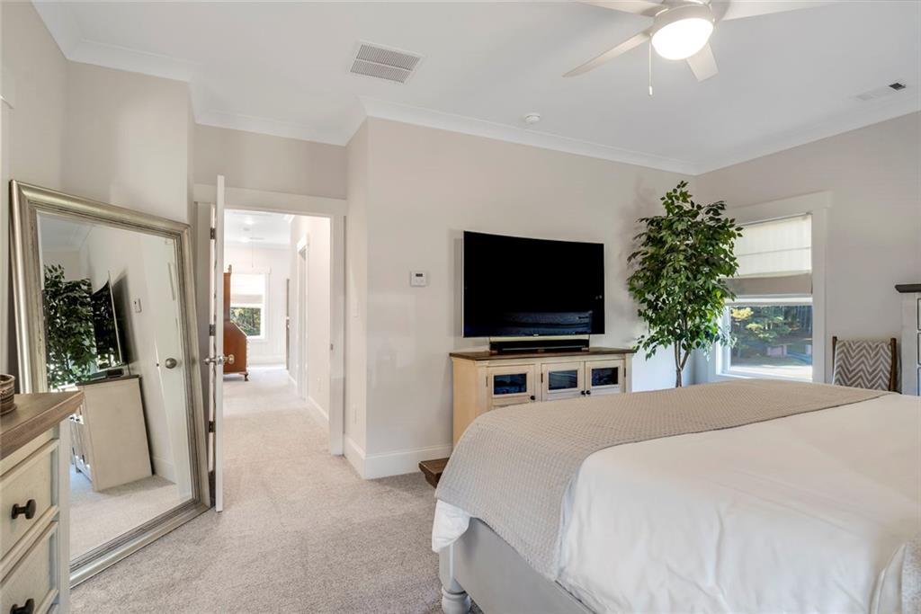 564 Old Airport Road Commerce, GA 30530 - Photo 26 of 39 a bedroom with a bed and a flat screen tv