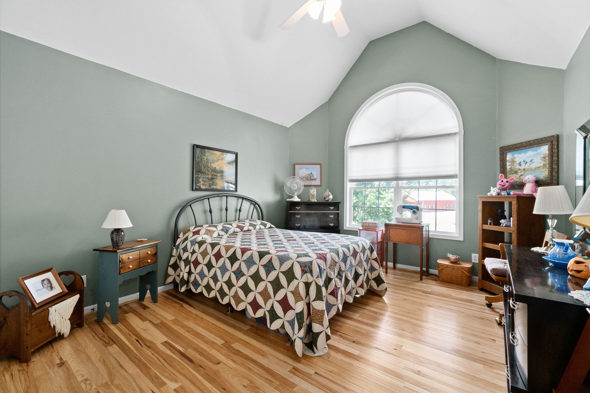 2111 Port Royal Road Adams, TN 37010 - Photo 29 of 63 a bedroom with bed and wooden floor