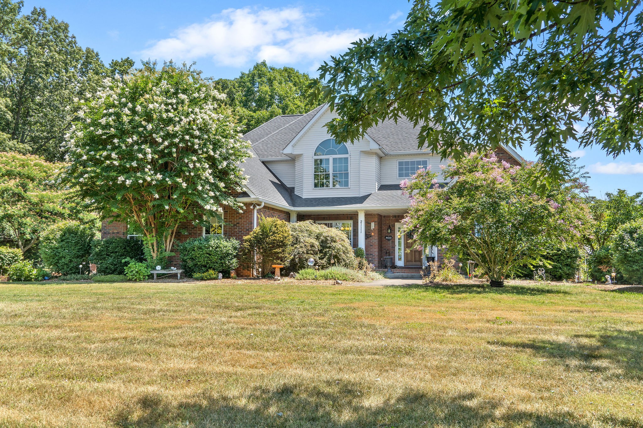 2111 Port Royal Road Adams, TN 37010 - Photo 4 of 63 a front view of a house with a yard