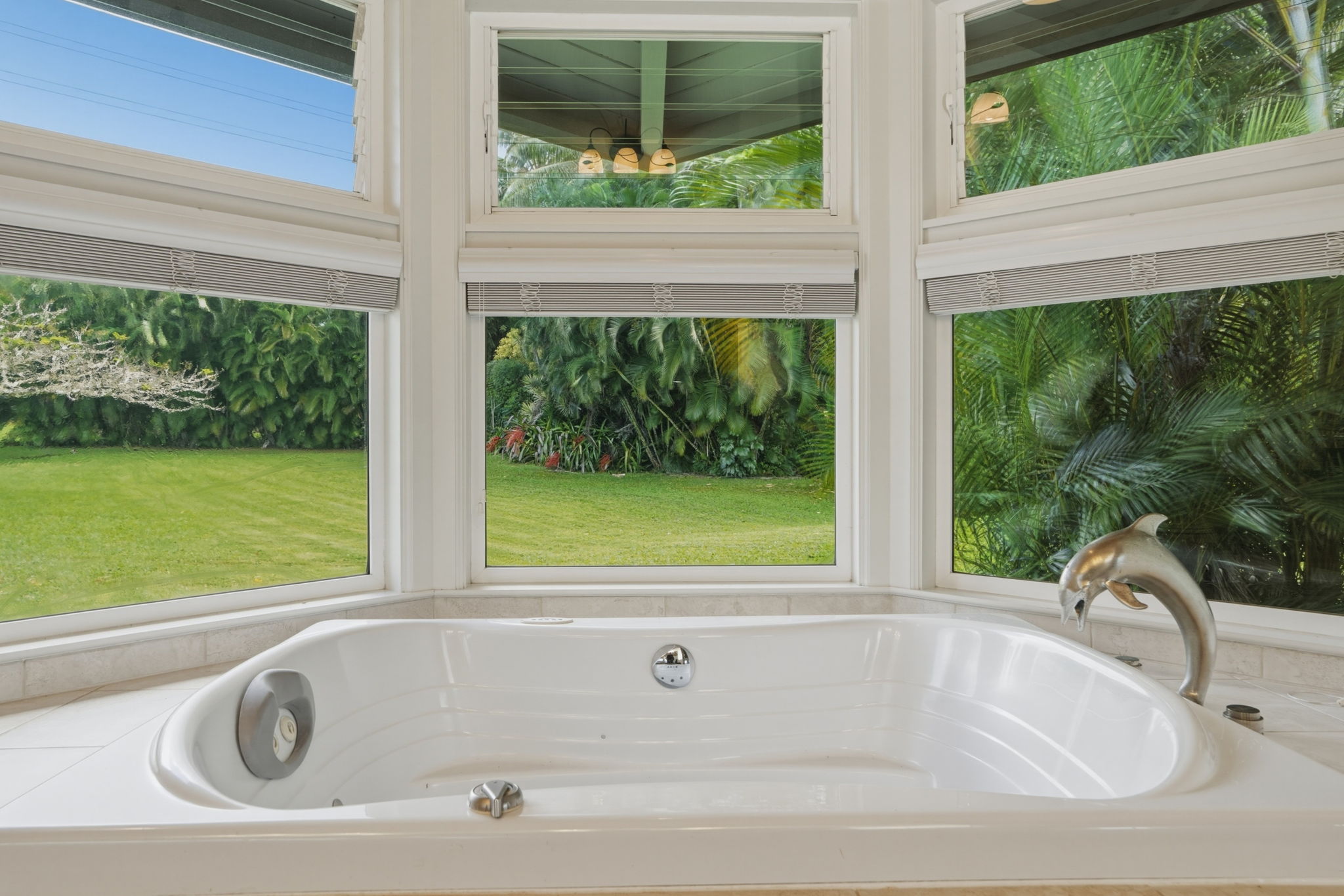 4928 Wailapa Road, Unit A Kilauea, HI 96754 - Photo 14 of 30 a bathroom with a bathtub and window