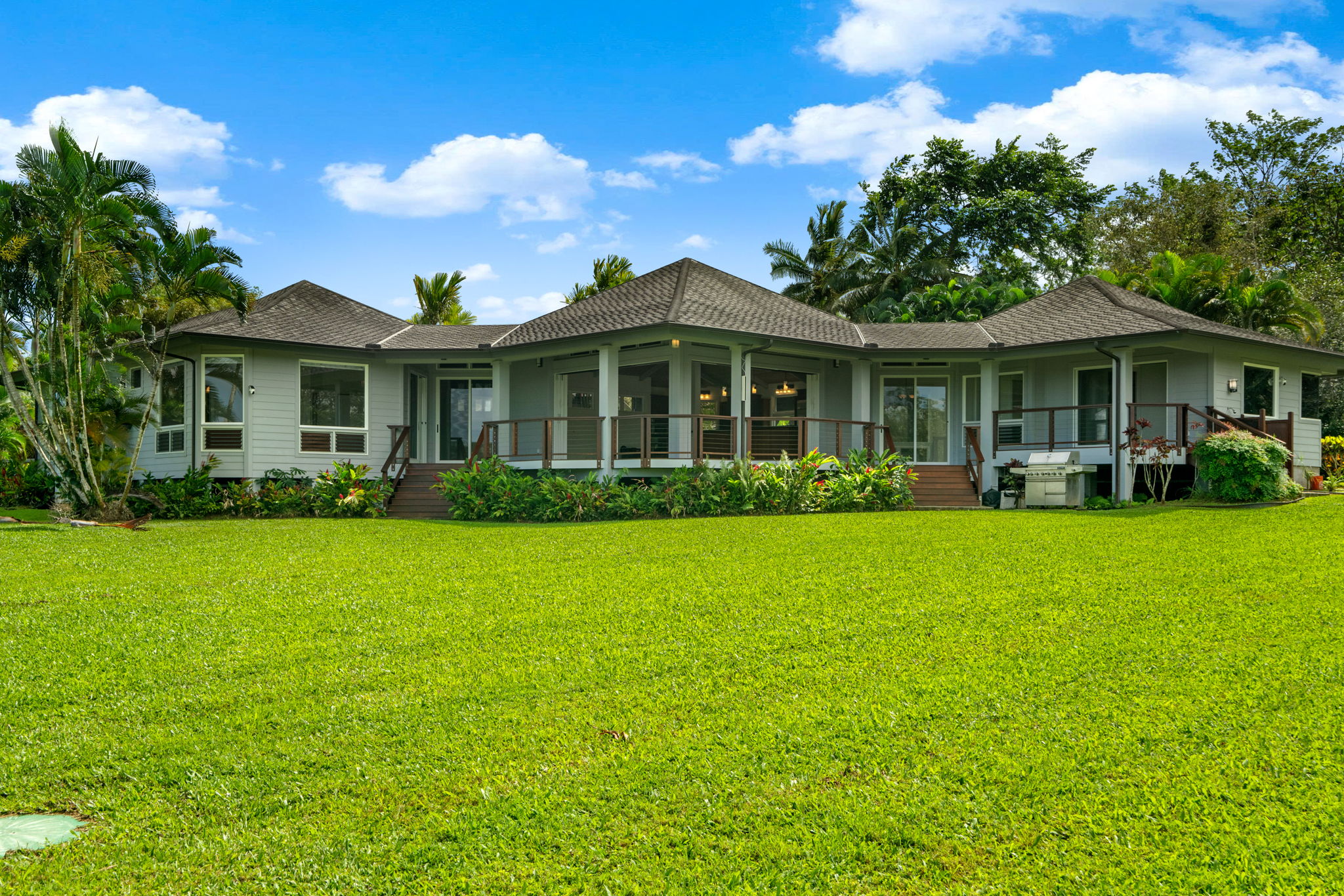 4928 Wailapa Road, Unit A Kilauea, HI 96754 - Photo 20 of 30 a front view of a house with garden