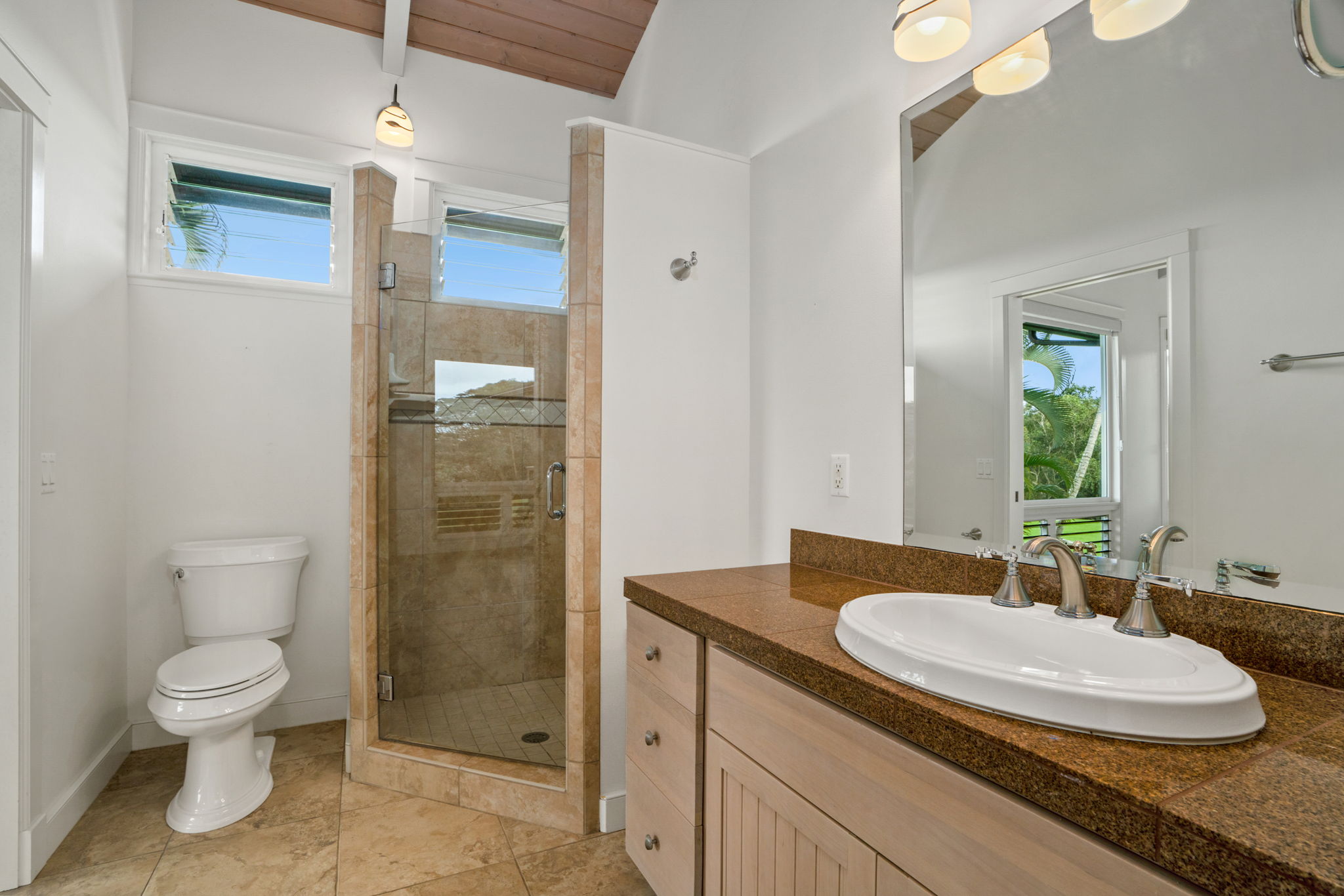 4928 Wailapa Road, Unit A Kilauea, HI 96754 - Photo 24 of 30 a bathroom with a sink toilet and shower