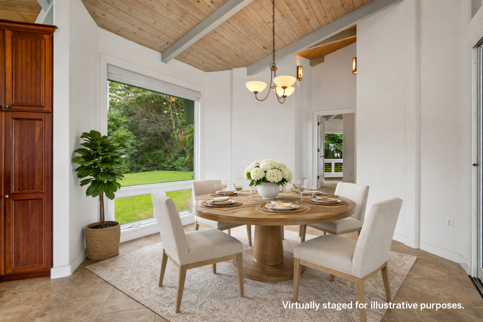 4928 Wailapa Road, Unit A Kilauea, HI 96754 - Photo 7 of 30 a view of a dining room with a table and chairs