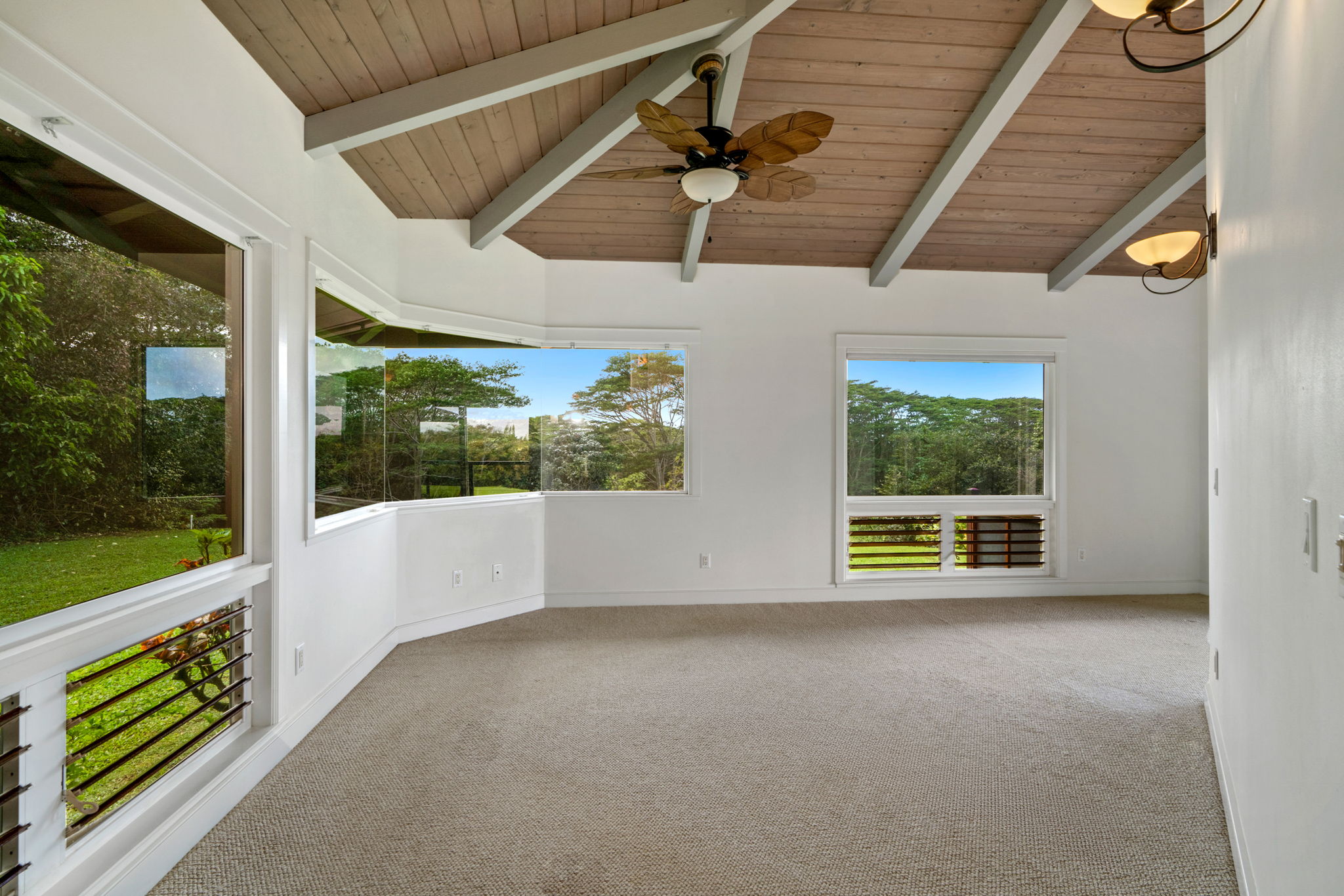 4928 Wailapa Road, Unit A Kilauea, HI 96754 - Photo 9 of 30 a view of an empty room with a balcony