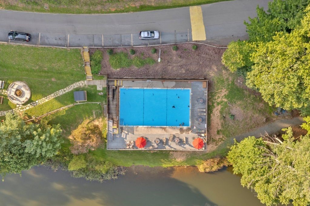 216 Saddle Lane Deep Gap, NC 28618 - Photo 44 of 44 an aerial view of a house with a yard and garden