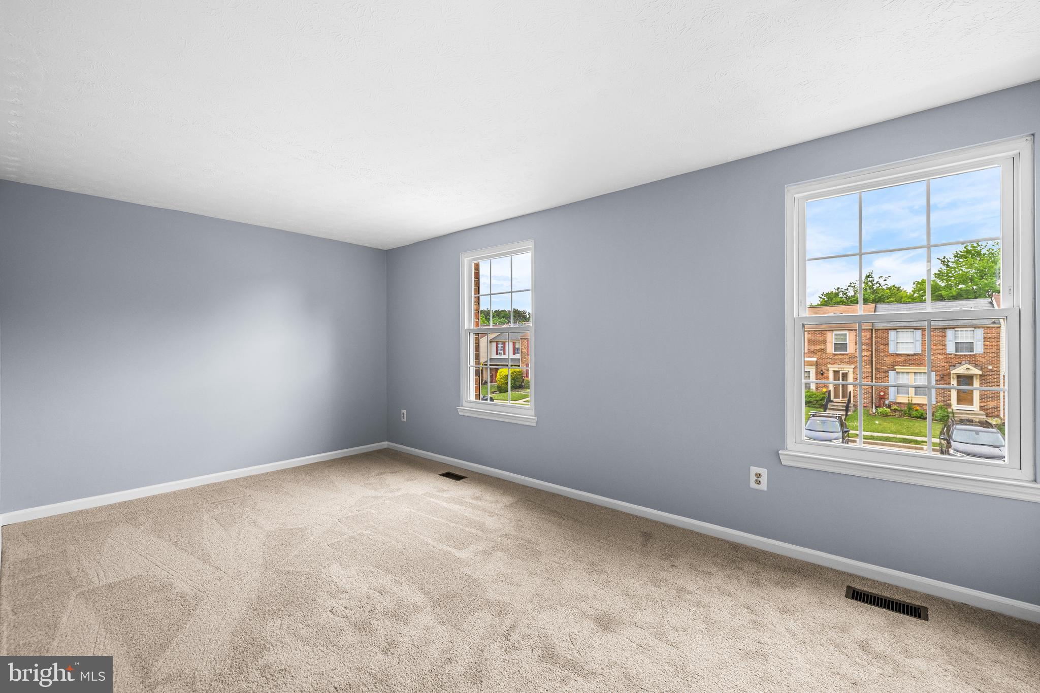 3790 Timahoe Circle Baltimore, MD 21236 - Photo 18 of 33 an empty room with windows