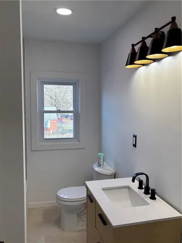 a bathroom with a bath tub with a shower