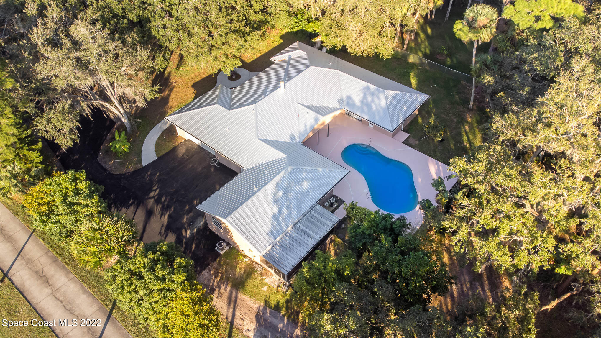 395 East Hall Road Merritt Island, FL 32953 - Photo 1 of 46 an aerial view of a house