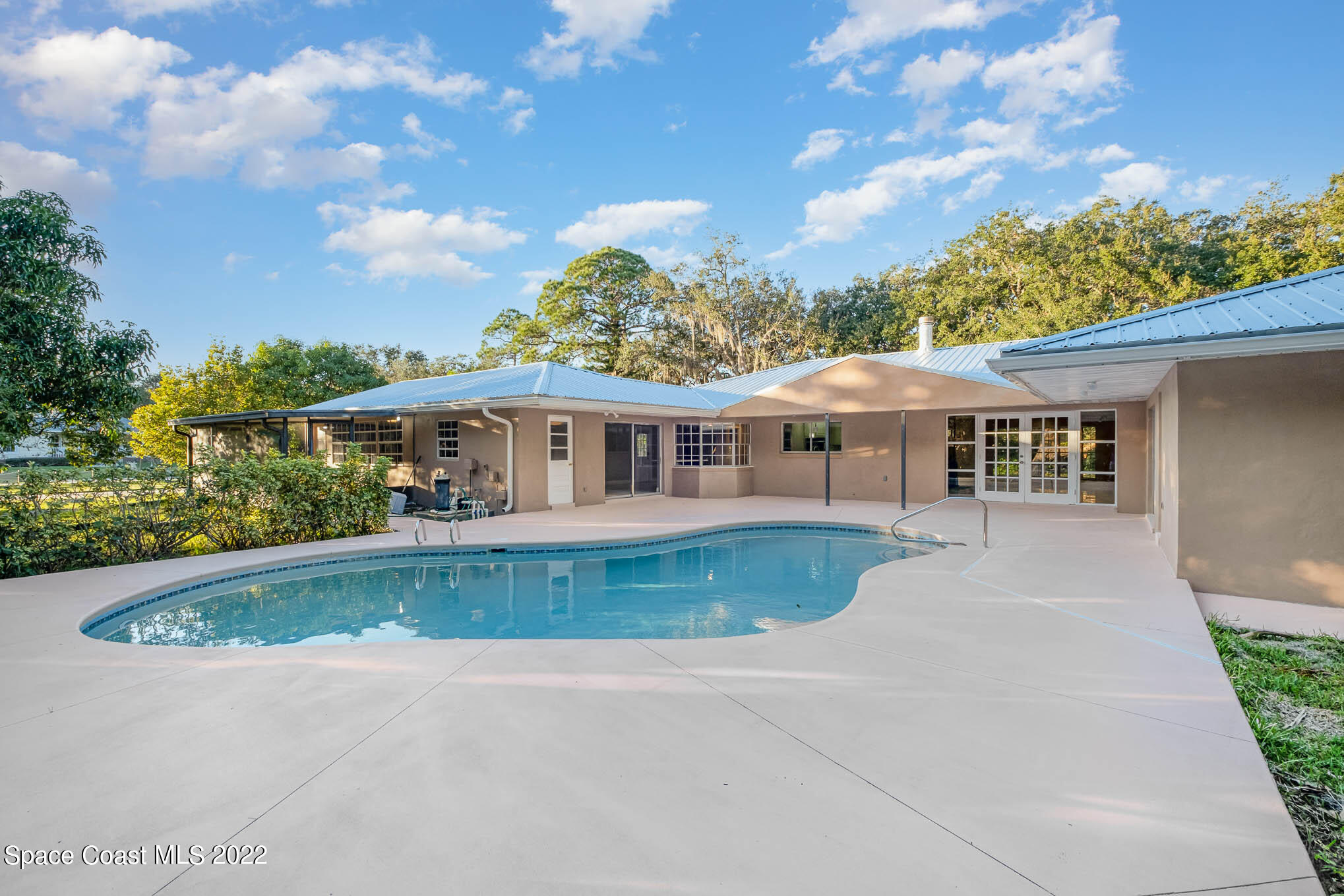 395 East Hall Road Merritt Island, FL 32953 - Photo 17 of 46 front view of house with a yard