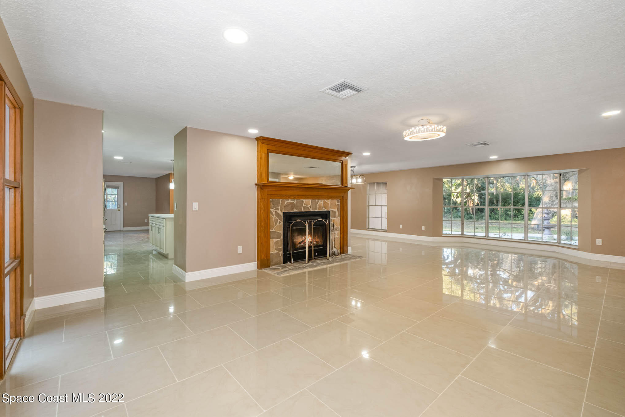 395 East Hall Road Merritt Island, FL 32953 - Photo 29 of 46 a view of a livingroom with a fireplace