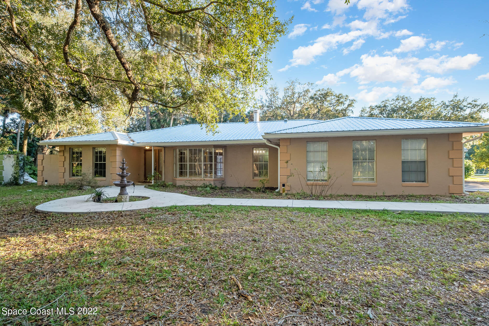 395 East Hall Road Merritt Island, FL 32953 - Photo 46 of 46 front view of a house with a yard