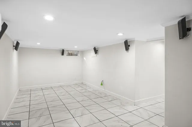 a view of entryway and hall with a window