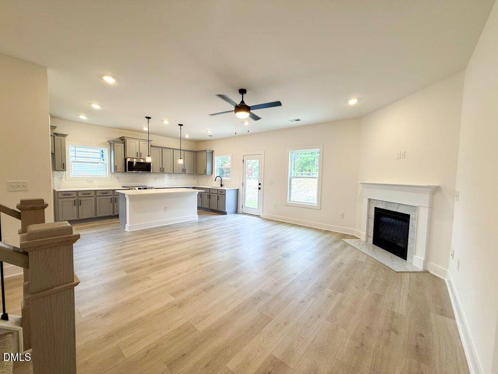 27 Decatur Drive Fuquay-Varina, NC 27526 - Photo 16 of 46 a view of kitchen with cabinets and wooden floor