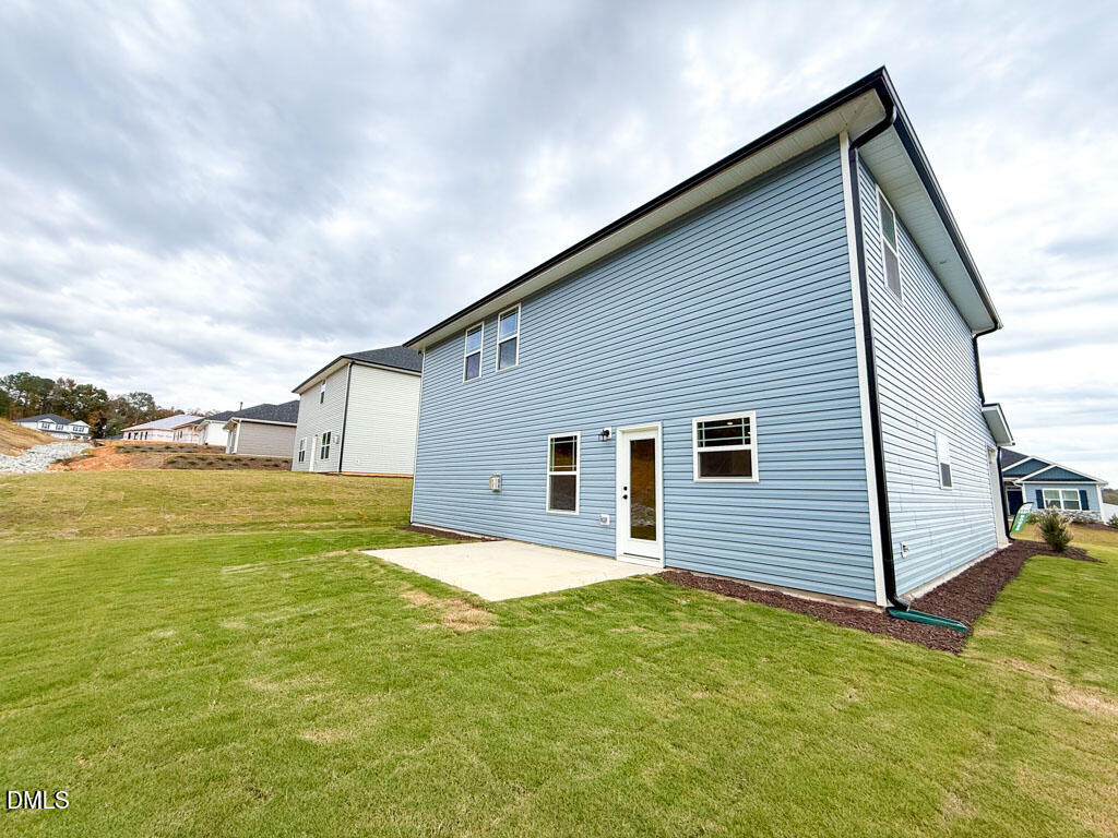 27 Decatur Drive Fuquay-Varina, NC 27526 - Photo 34 of 46 a view of a house with a yard