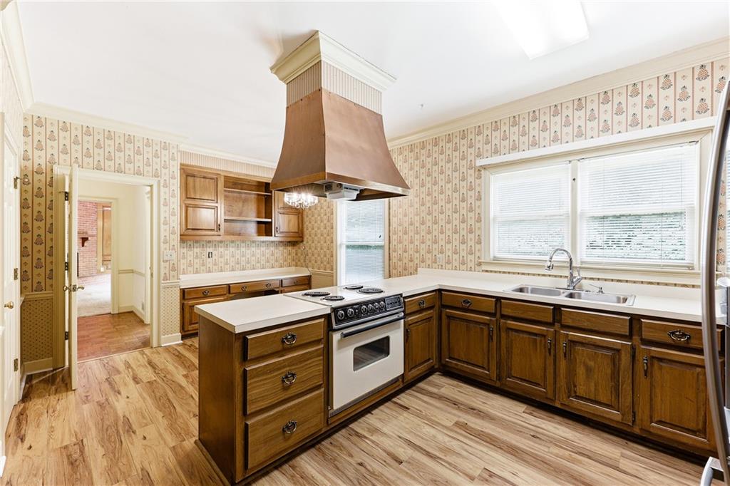 3608 Maple Forge Lane Gainesville, GA 30504 - Photo 14 of 45 a kitchen that has a sink and a stove