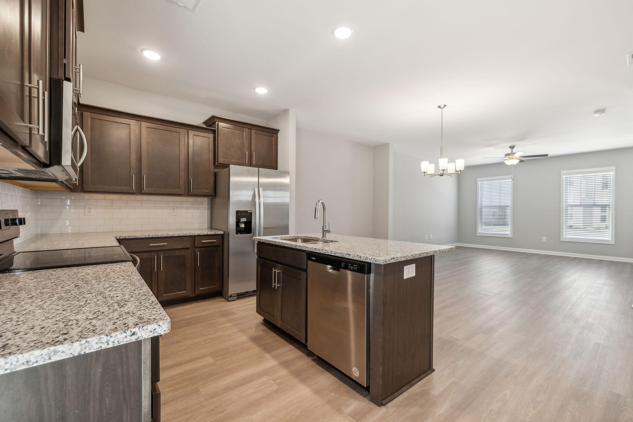 Undisclosed Address Lebanon, TN 37087 - Photo 3 of 13 a kitchen with stainless steel appliances granite countertop a stove a sink and a refrigerator