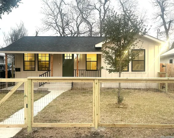 a view of a swimming pool with an outdoor seating
