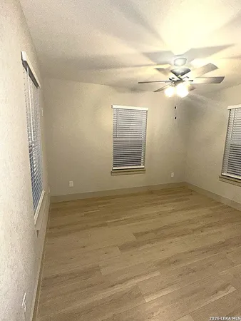 a view of a room with rack and wooden floor