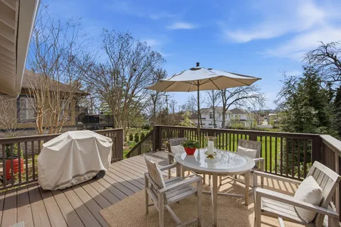 a view of a chairs and table on the wooden floor