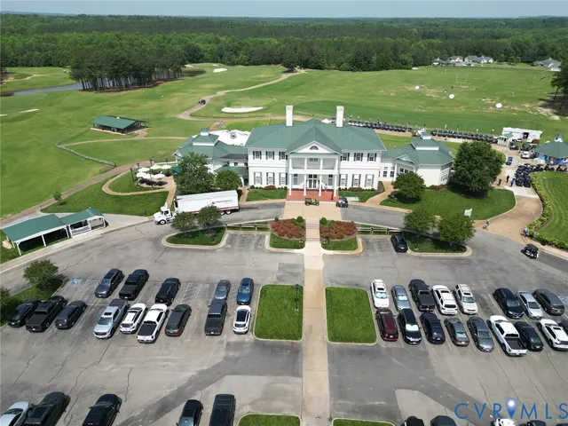 an aerial view of multiple houses with outdoor space
