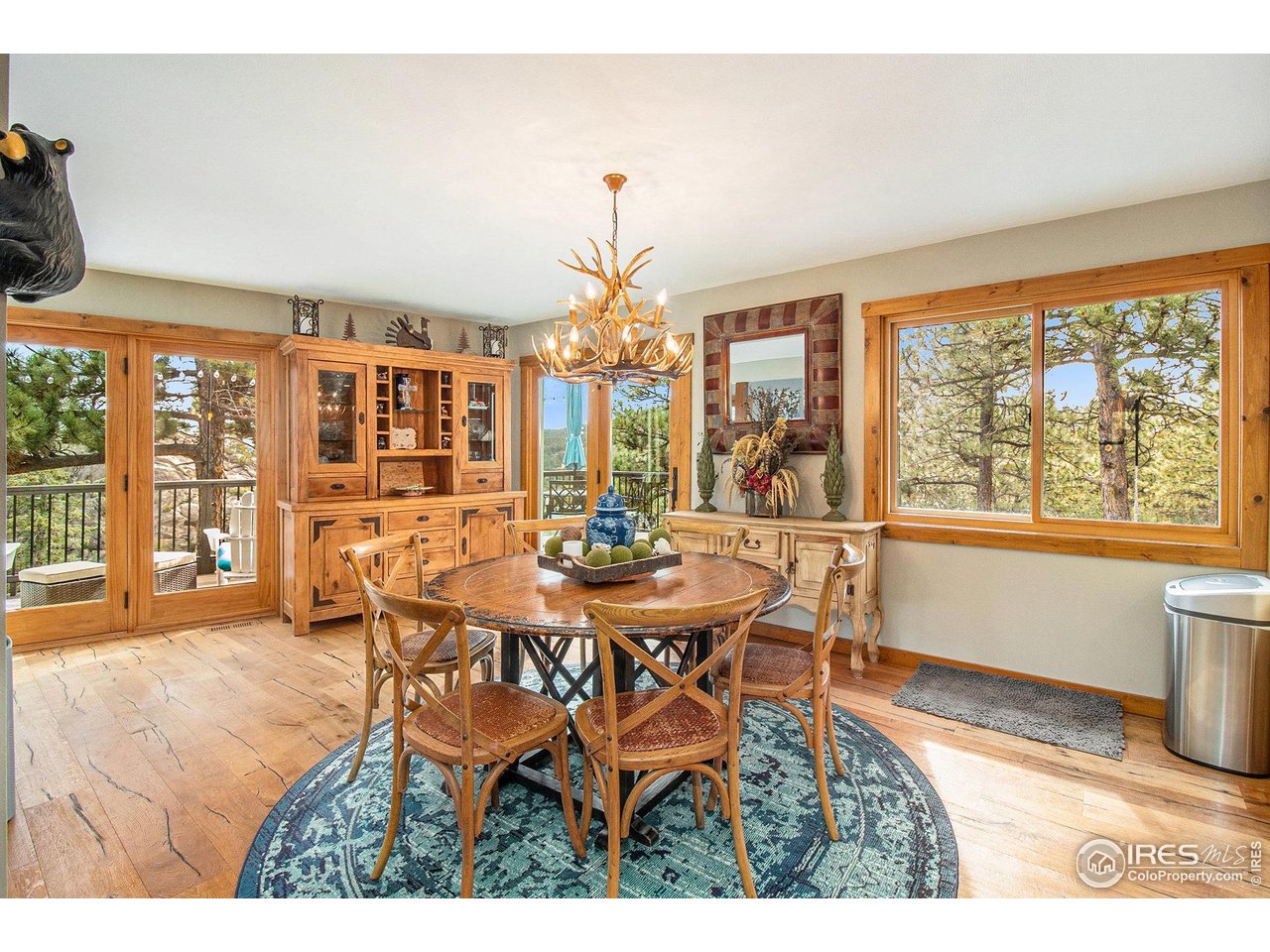 270 Choctaw Road Lyons, CO 80540 - Photo 5 of 30 Main Level Dining Area with access out to the large deck.