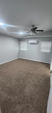 a view of a refrigerator in a room