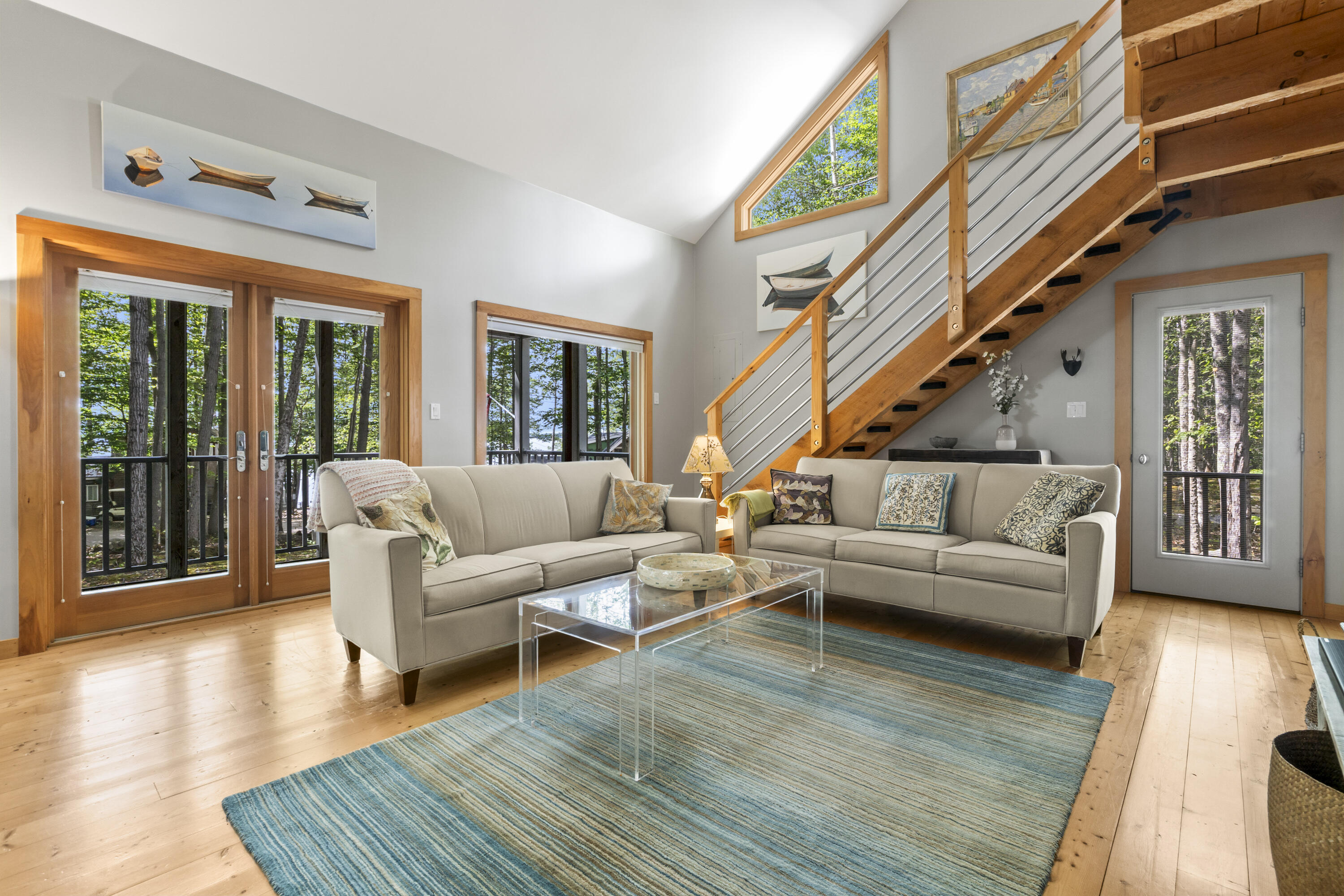 189 Ridge Road Frye Island, ME 04084 - Photo 14 of 49 189 Living room and french front doors