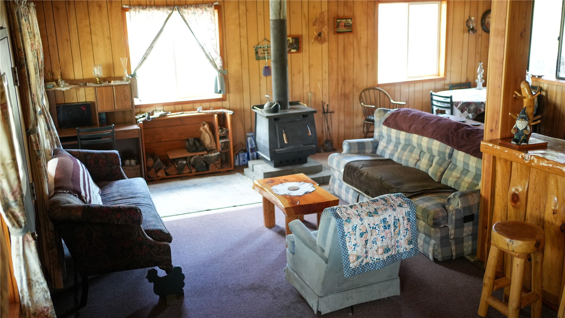 240 Old Railroad Road Oroville, WA 98844 - Photo 13 of 24 a living room with furniture and a window