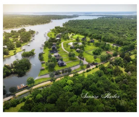 a view of a lake with a yard